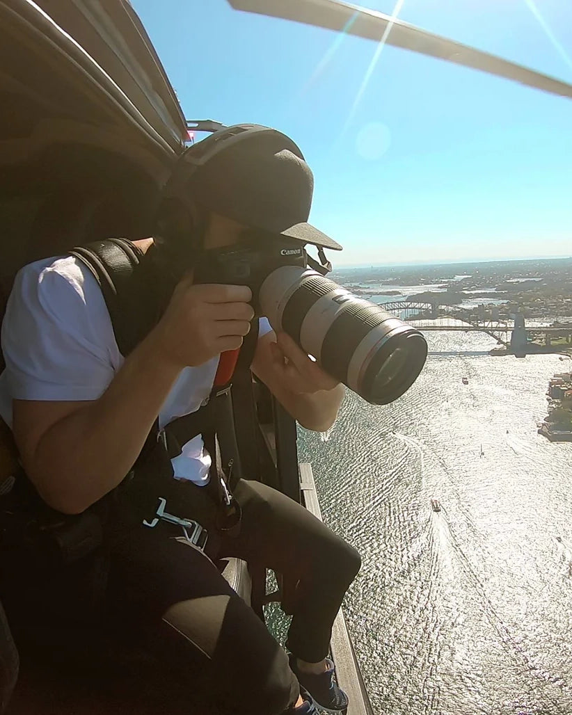 Remy Gerega photographing from the air