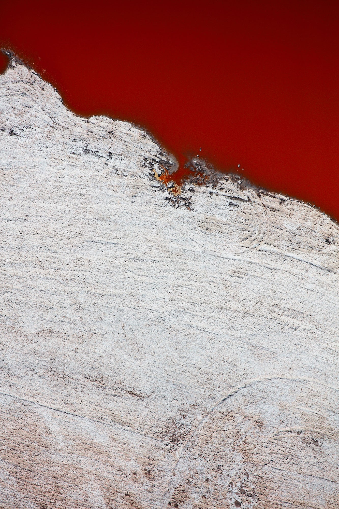 Aerial photography from a doorless R22 helicopter over the San Francisco Bay Cargill Salt Ponds. Limited & open edition fine art prints available for purchase.