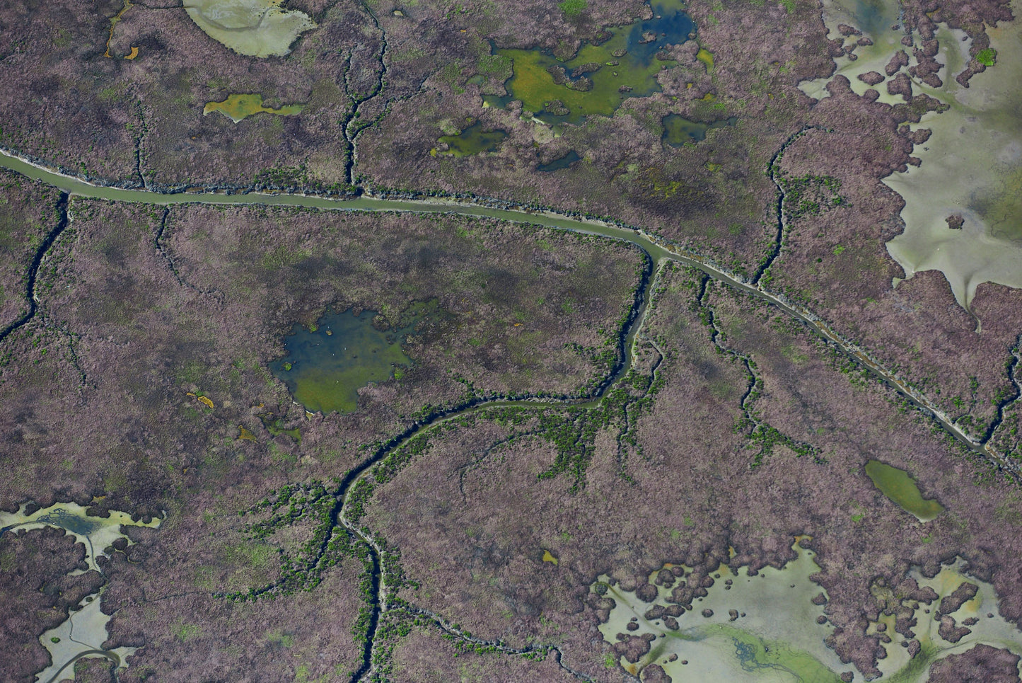 Aerial photography from a doorless R22 helicopter over the San Francisco Bay Cargill Salt Ponds. Limited & open edition fine art prints available for purchase.