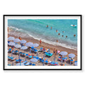 Aerial view of Positano beach with blue umbrellas, swimmers and turquoise water, Amalfi Coast, photography print by Remy G...