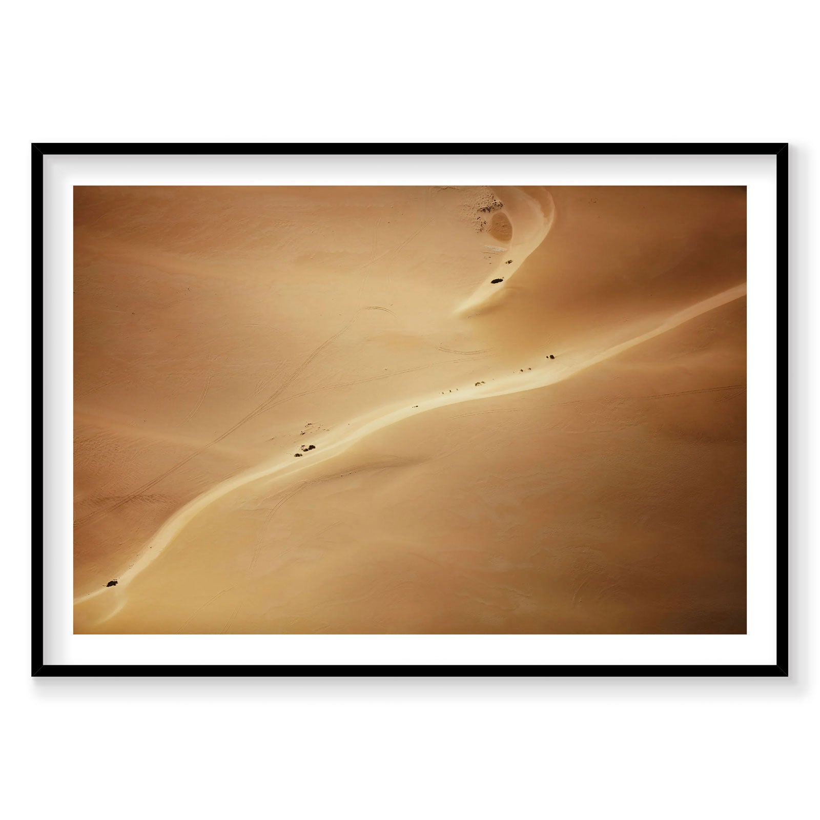 Aerial view of golden sand dunes and vehicle tracks in Kalbarri, Western Australia, photography print by Remy Gerega
