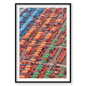 Aerial view of colorful beach umbrellas and loungers on Positano sand, Amalfi Coast, photography print by Remy Gerega