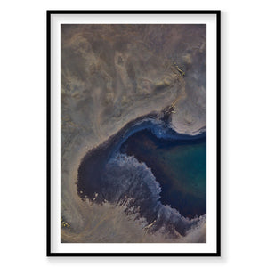 Aerial view of Iceland's volcanic landscape with turquoise geothermal lake and mineral deposits, photography print by Remy...