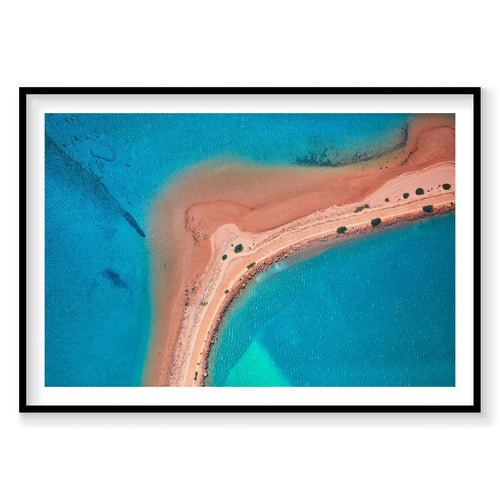 Aerial view of Boomerang Beach with pink sand and turquoise waters, photography print by Remy Gerega