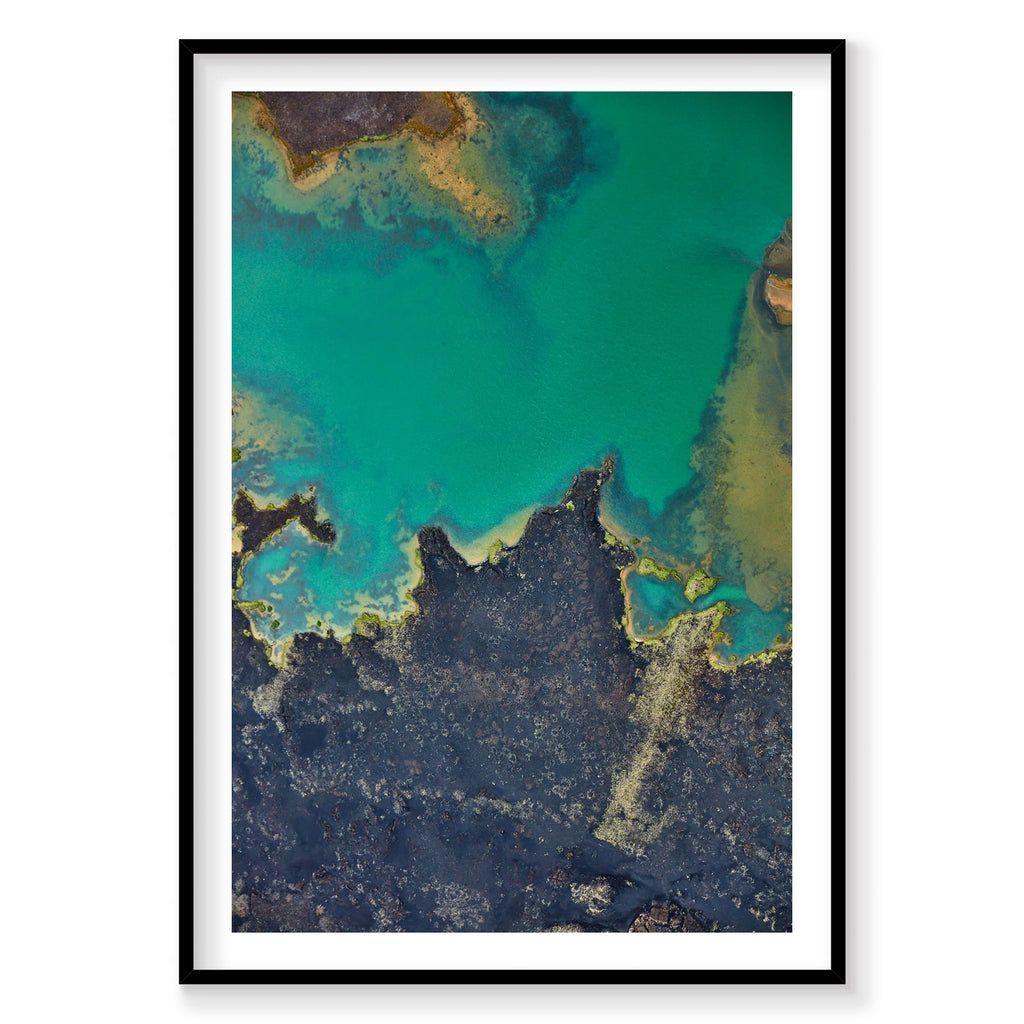 Aerial view of Mývatn Lake Iceland with turquoise water and dark volcanic rock formations, photography print by Remy Gerega