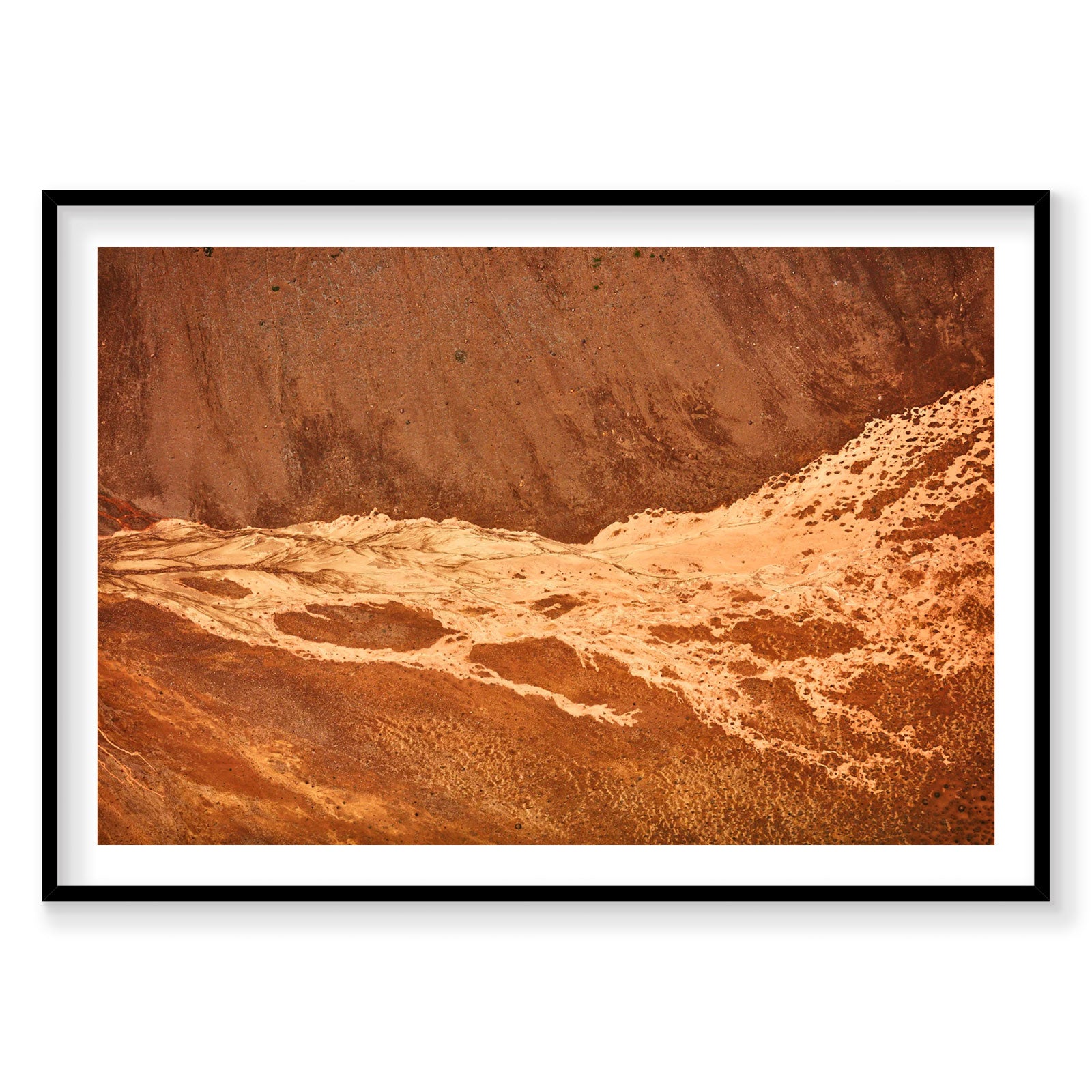 Aerial view of Icelandic geothermal streams with rust-red mineral deposits and sandy terrain, photography print by Remy Ge...