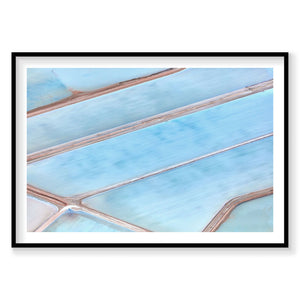 Aerial view of geometric blue salt evaporation ponds with brown dividing lines, photography print by Remy Gerega