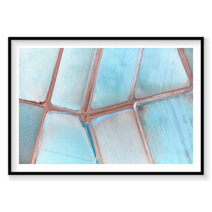 Aerial view of turquoise salt evaporation ponds with geometric patterns, photography print by Remy Gerega