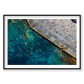 Aerial view of Clovelly Beach with turquoise water, swimmers, and yellow pool barrier, photography print by Remy Gerega