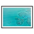 Aerial view of Catseye Beach Hamilton Island with turquoise water and colorful boats, photography print by Remy Gerega