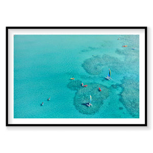 Aerial view of Catseye Beach Hamilton Island with turquoise water and colorful boats, photography print by Remy Gerega