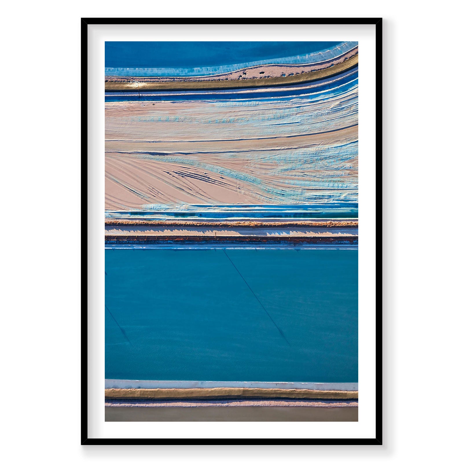 Aerial view of colorful salt evaporation ponds in Moab, Utah with blue and pink mineral layers, photography print by Remy ...