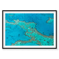 Aerial view of Great Barrier Reef coral formations in turquoise waters from above, photography print by Remy Gerega