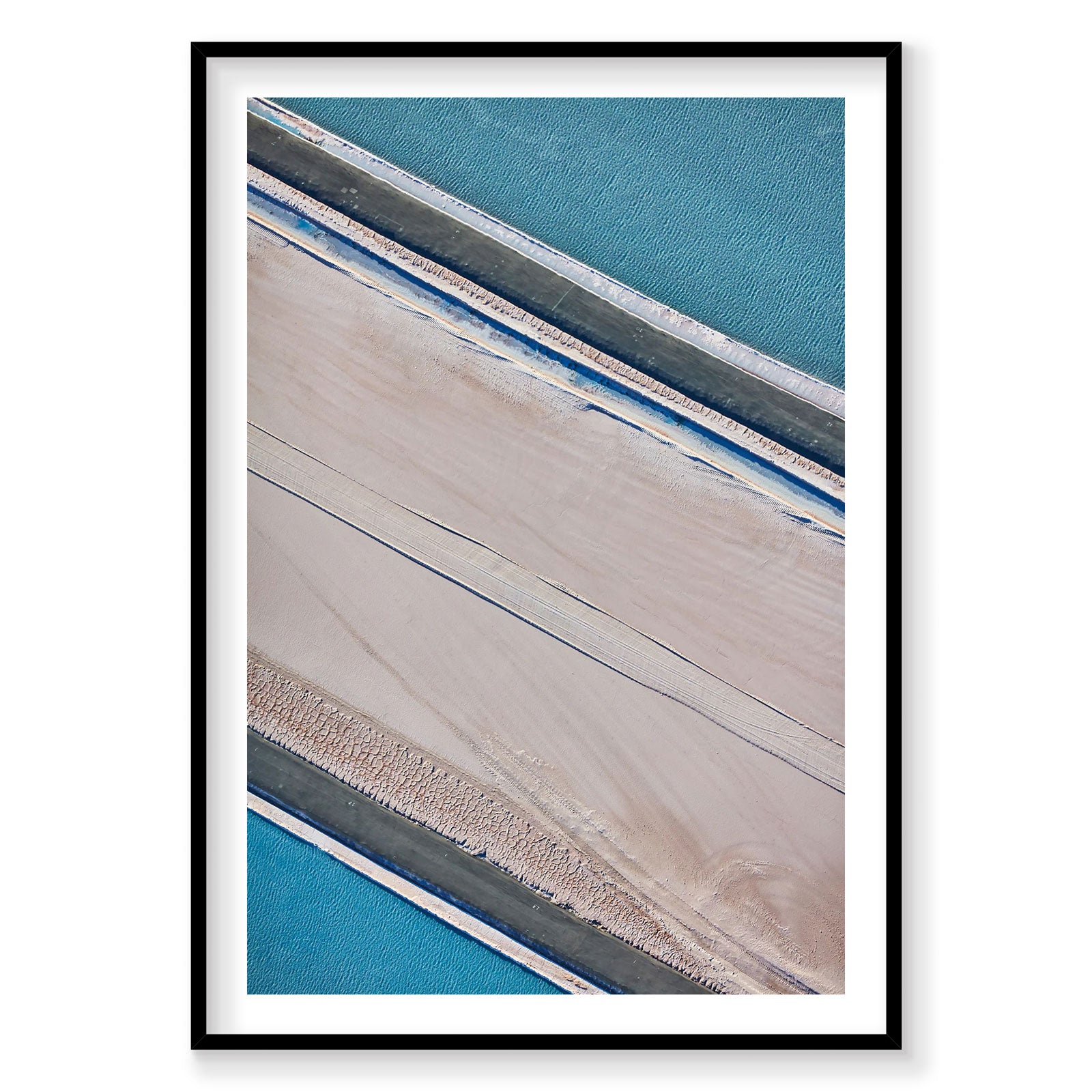 Aerial view of Moab's pink salt evaporation ponds with turquoise water, photography print by Remy Gerega