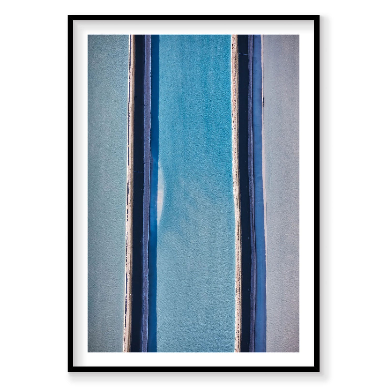 Aerial view of blue dye evaporation ponds in Moab with geometric patterns, photography print by Remy Gerega