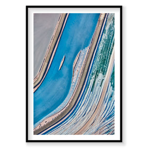 Aerial view of vibrant blue leaching ponds in Moab with geometric patterns and mineral deposits, photography print by Remy...