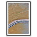 Aerial view of Moab phosphorus ponds with curved blue barrier and tan water, photography print by Remy Gerega