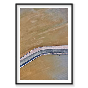 Aerial view of Moab phosphorus ponds with curved blue barrier and tan water, photography print by Remy Gerega