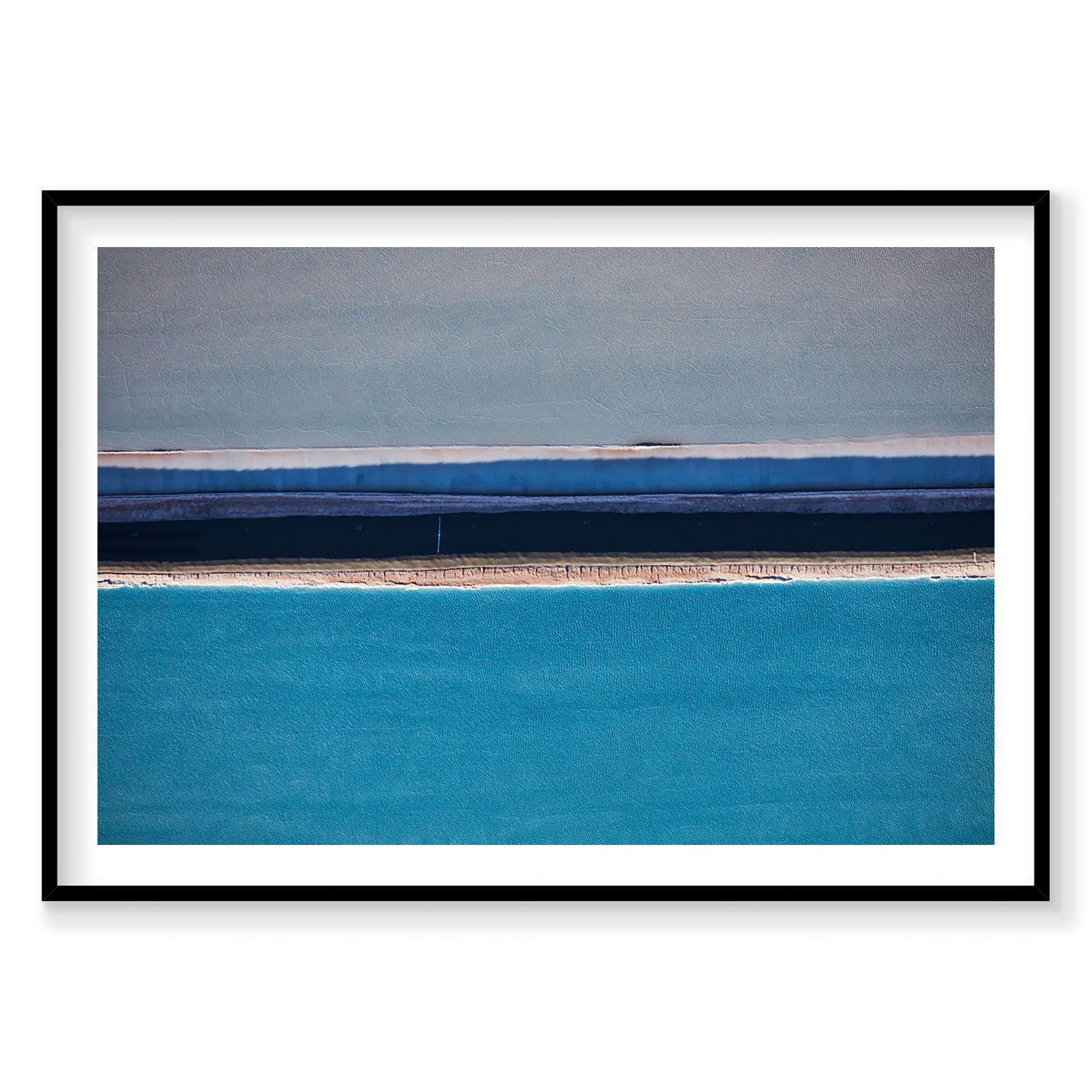 Aerial view of turquoise swimming lane with geometric sections and desert landscape, Moab, photography print by Remy Gerega