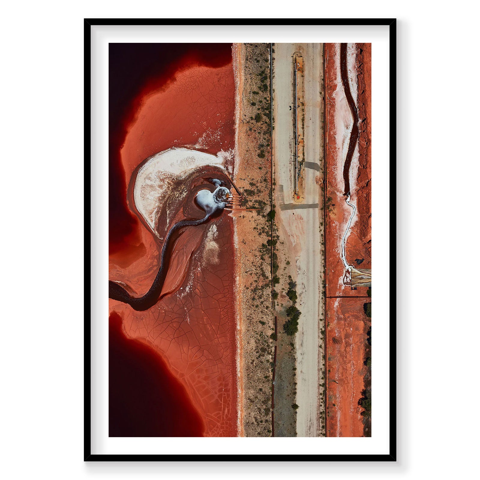 Aerial view of vibrant red salt pond with worker, Western Australia, photography print by Remy Gerega