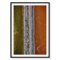 Aerial view of Tyre Pit at Great Salt Lake with golden and orange waters, photography print by Remy Gerega