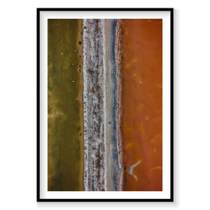 Aerial view of Tyre Pit at Great Salt Lake with golden and orange waters, photography print by Remy Gerega