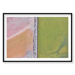 Aerial view of Great Salt Lake with pink and green water divided by a gray causeway, photography print by Remy Gerega