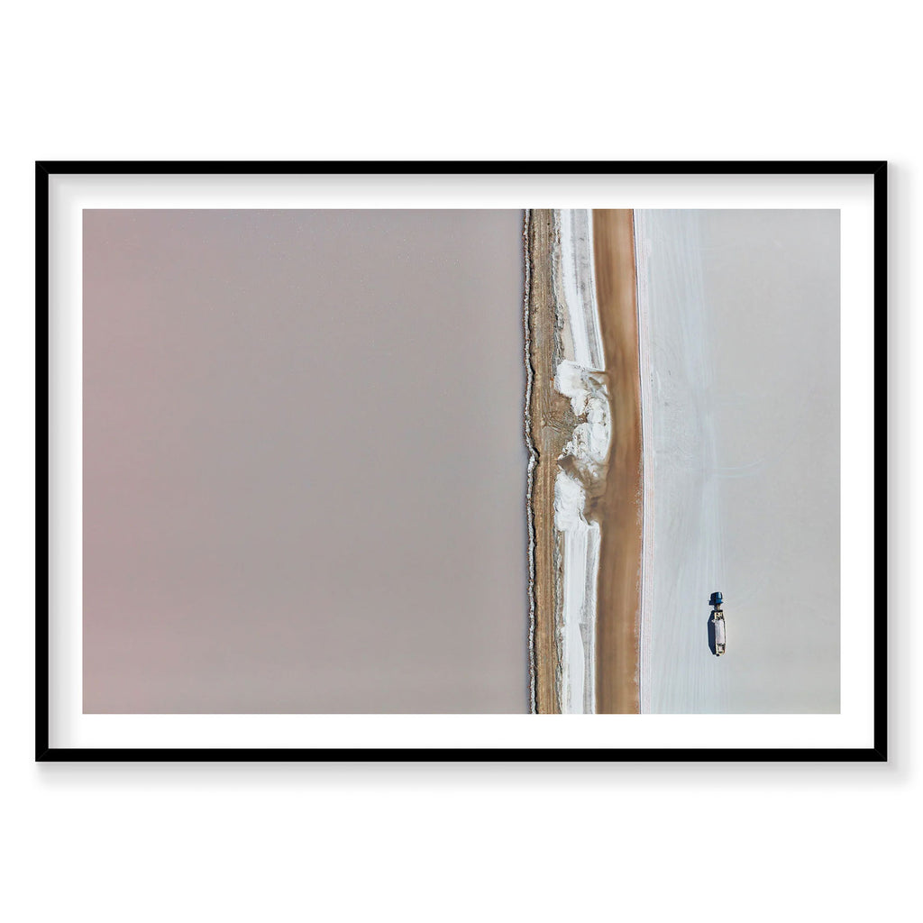 Aerial view of Great Salt Lake with solitary figure on white salt flat, photography print by Remy Gerega