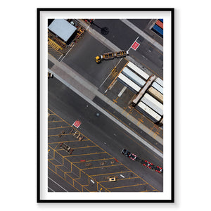 Aerial view of industrial loading zone with yellow line markings, trucks, and containers at Botany Bay, photography print ...