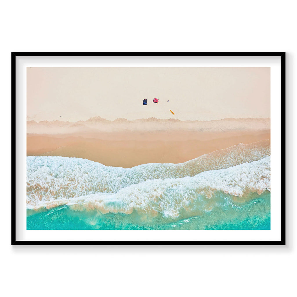 Aerial view of Byron Bay beach with turquoise waves, white foam, and colorful kites, photography print by Remy Gerega
