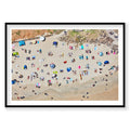 Aerial view of Byron Bay beach with colorful umbrellas and sunbathers scattered on sand, photography print by Remy Gerega