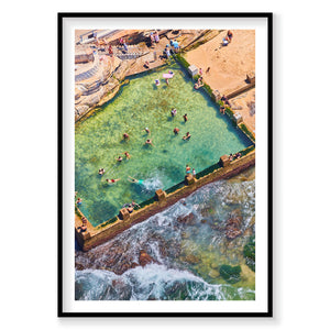 Aerial view of Coogee Ocean Pool with turquoise water and crashing waves, photography print by Remy Gerega