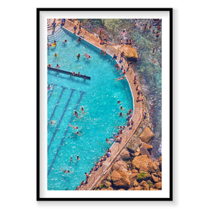 Aerial view of Bronte Baths turquoise pool with swimmers and rocky coastline, photography print by Remy Gerega