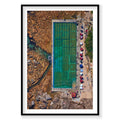 Aerial view of turquoise freshwater pool by rocky coastline with umbrellas and visitors, photography print by Remy Gerega