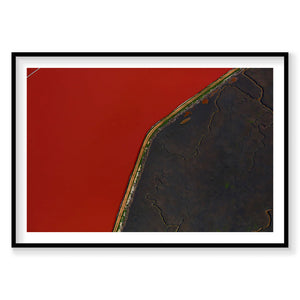 Aerial view of San Francisco Bay with red water and dark shoreline, photography print by Remy Gerega