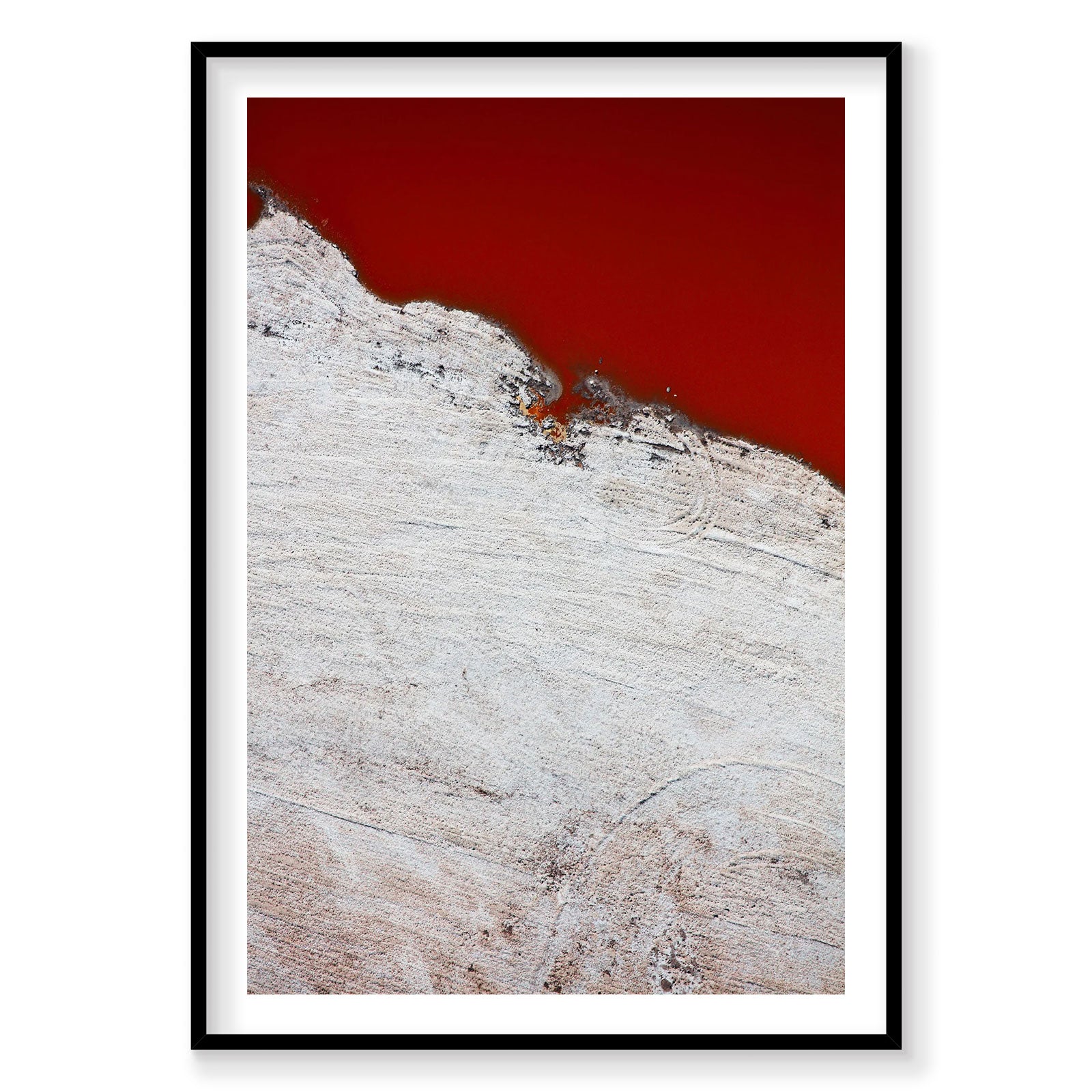 Aerial view of white salt mounds meeting vibrant red water in San Francisco Bay, photography print by Remy Gerega