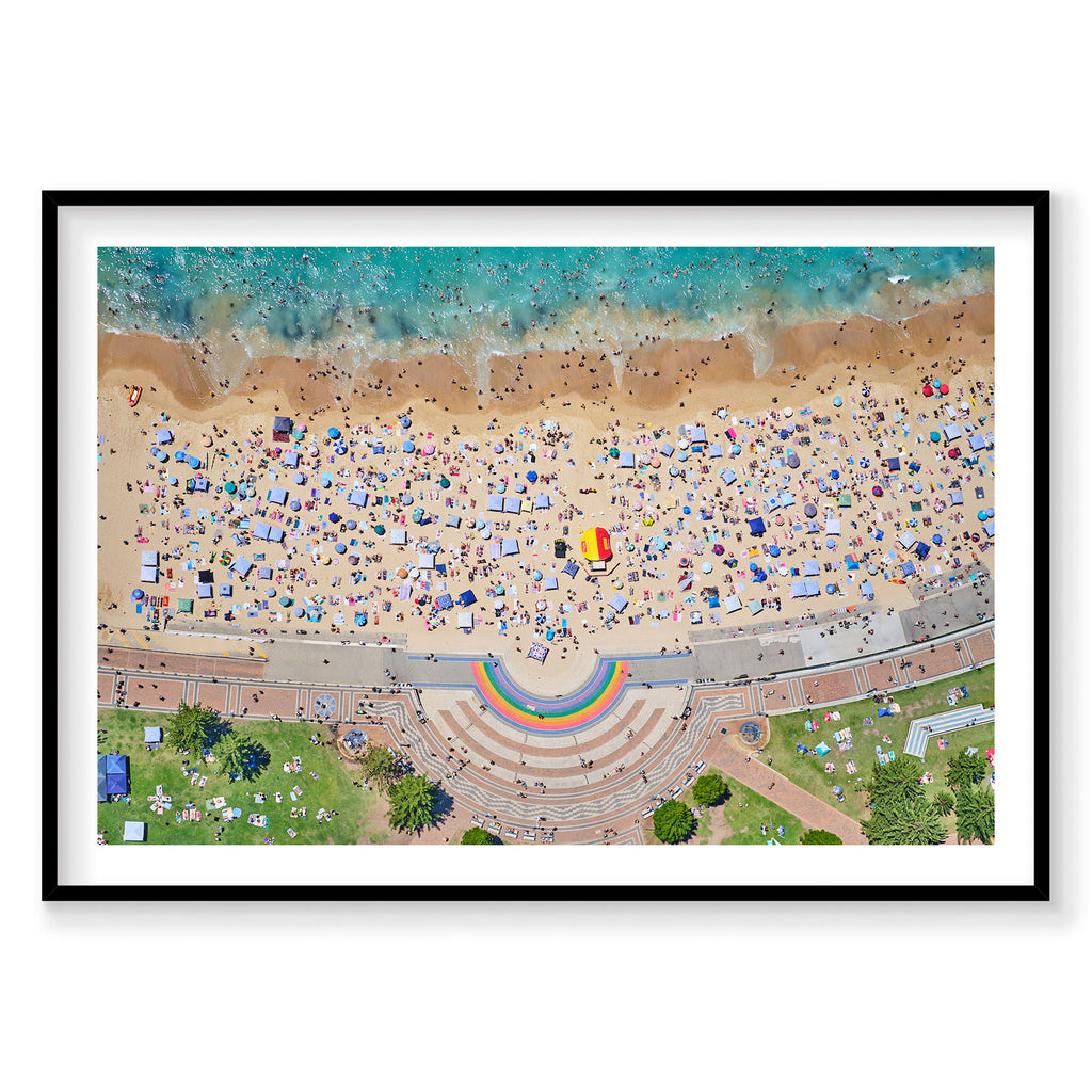 Aerial view of Coogee Beach with rainbow pool and sunbathers from above, photography print by Remy Gerega