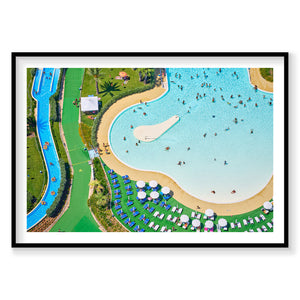 Aerial view of Aquapark Egnazia Italy with turquoise pools, sandy beaches and umbrellas, photography print by Remy Gerega