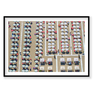 Aerial view of Italian beach with organized umbrellas and beach chairs in geometric rows, photography print by Remy Gerega