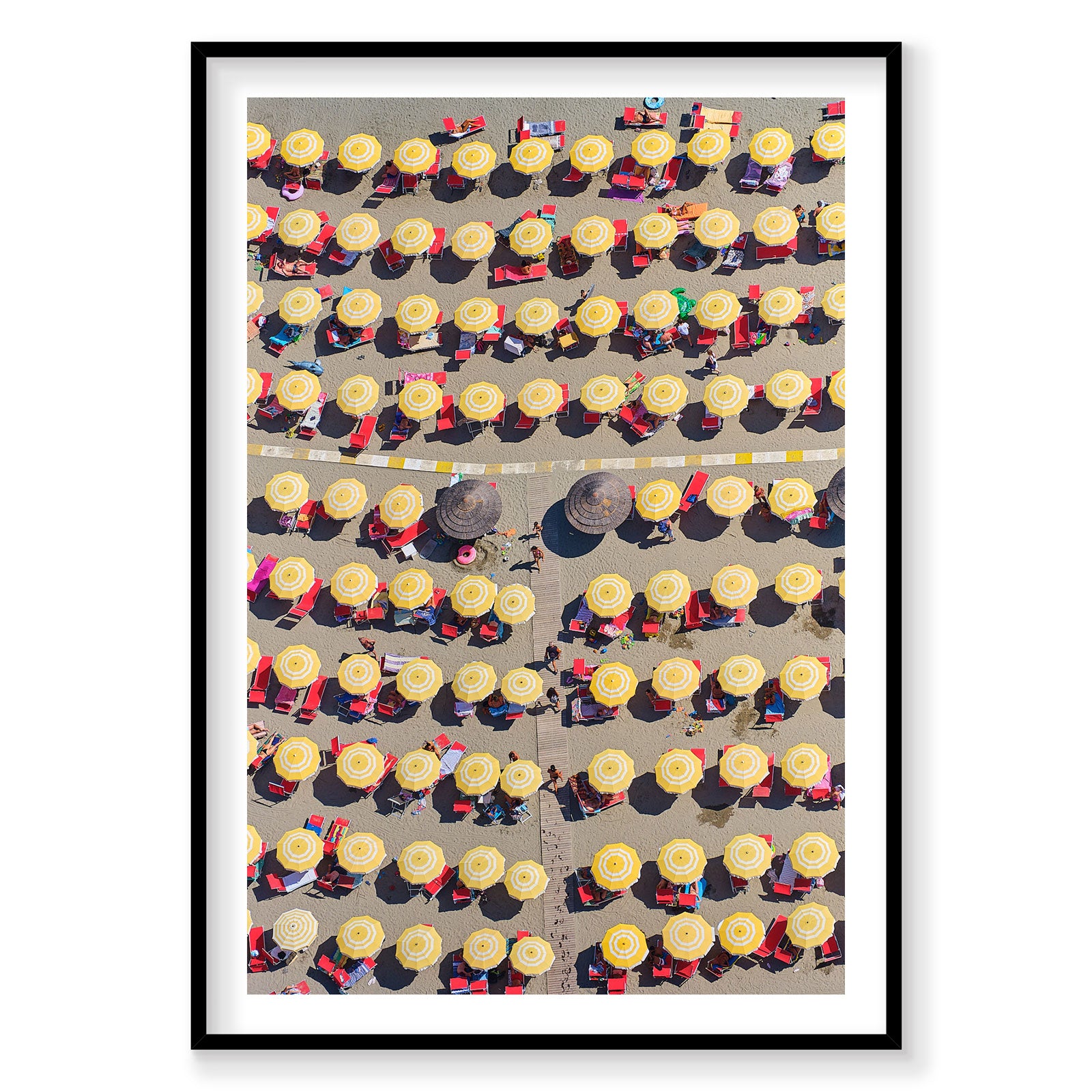 Aerial view of Italian beach with yellow umbrellas and red loungers from above, photography print by Remy Gerega