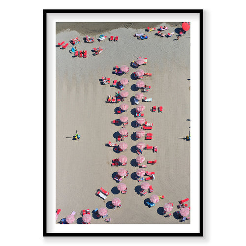 Aerial view of red and white striped beach umbrellas arranged on Italian sand, photography print by Remy Gerega