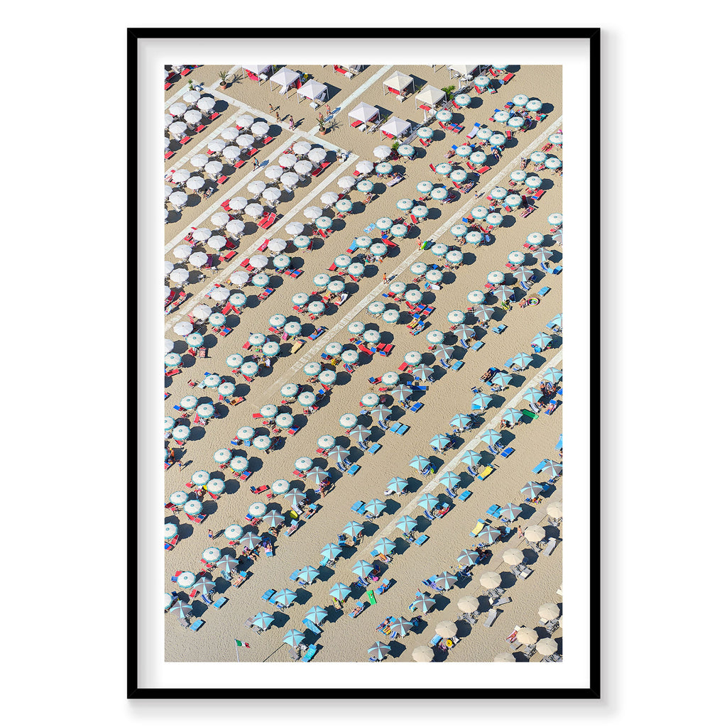 Aerial view of Italian beach with organized rows of umbrellas and sunbathers, photography print by Remy Gerega