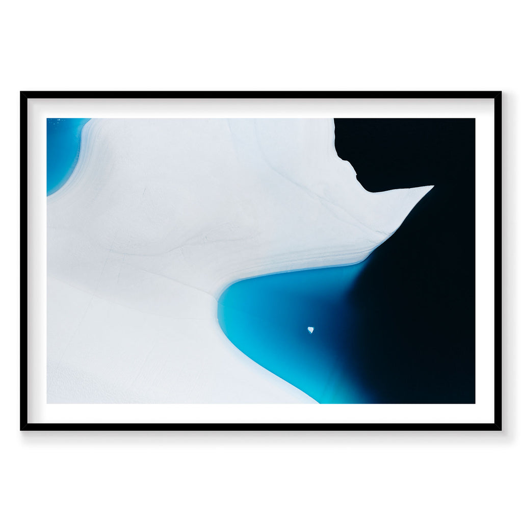 Aerial view of turquoise glacial lake meeting white ice cliffs in Greenland, photography print by Remy Gerega