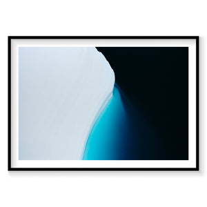 Aerial view of turquoise glacier meltwater meeting dark ocean in Greenland, photography print by Remy Gerega