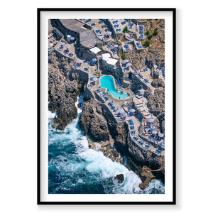 Aerial view of Lido del Faro cliffside pool Italy with turquoise water and ocean waves, photography print by Remy Gerega