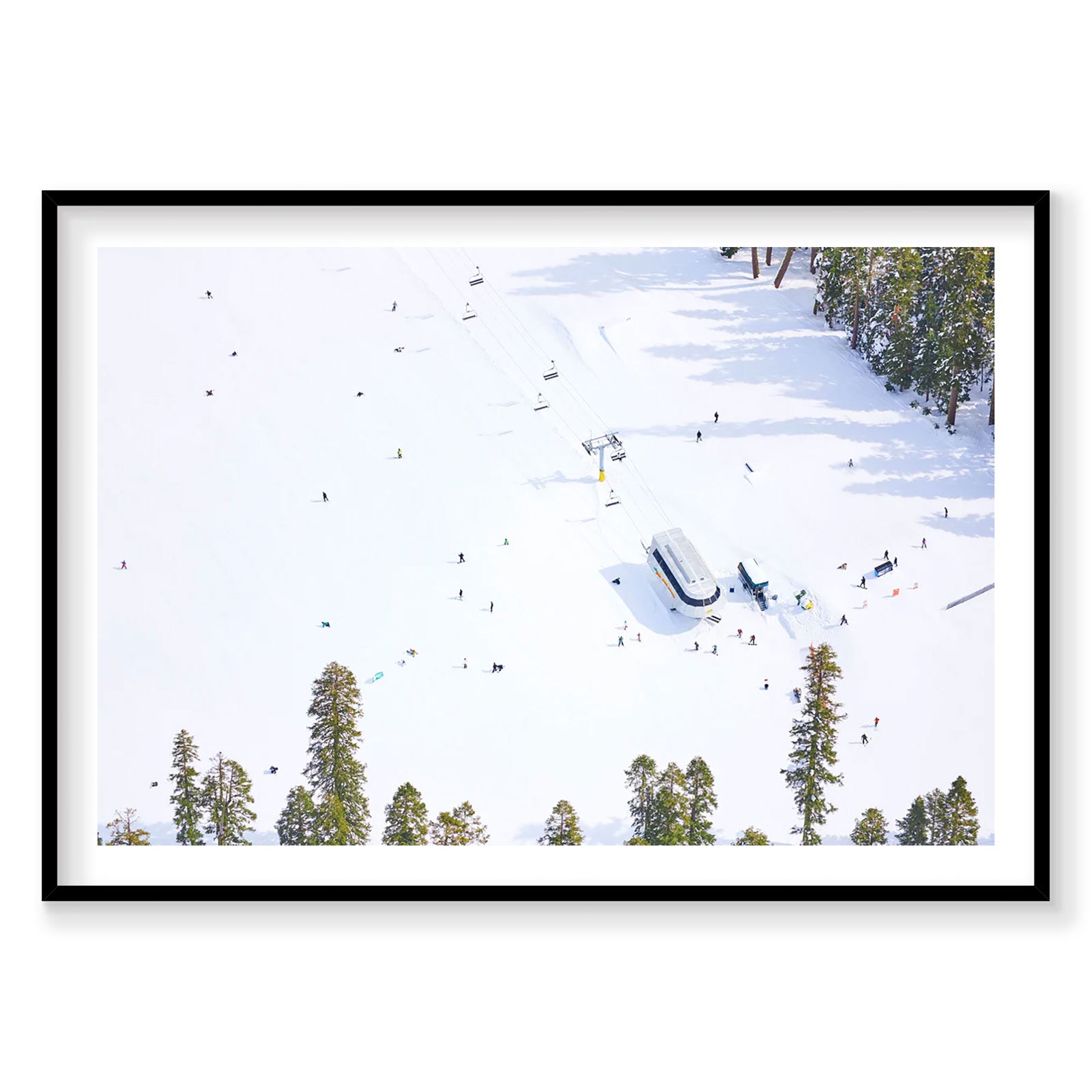 Aerial view of snow-covered Lake Tahoe with boats and skiers from above, photography print by Remy Gerega