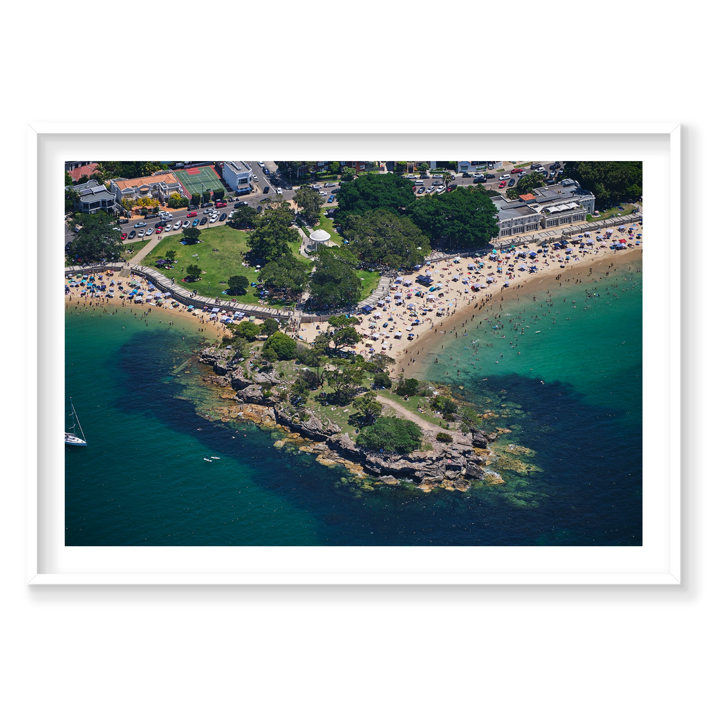 Horizontal photograph of Balmoral Beach in Sydney, shown in a white frame.