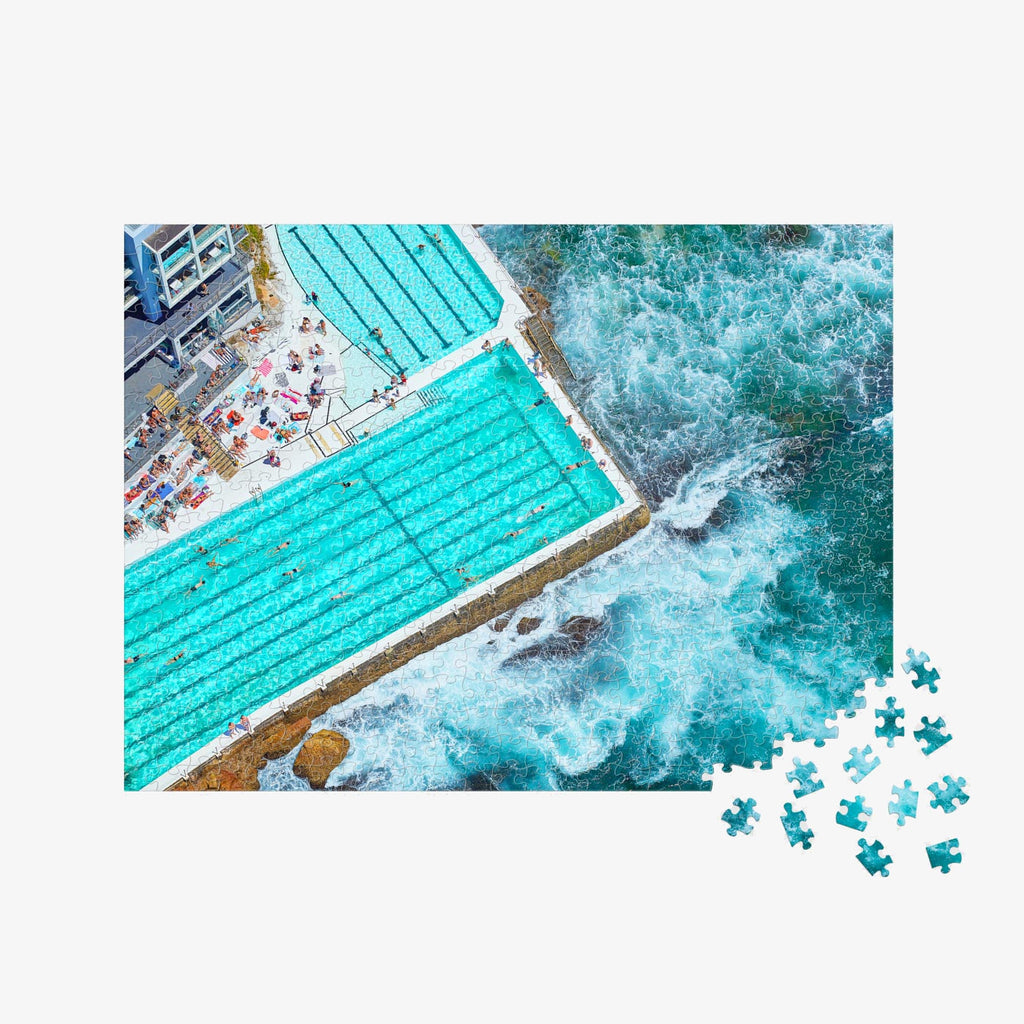 Aerial view of Bondi Beach swimming pool with turquoise water and crashing ocean waves, 500 piece jigsaw puzzle by Remy Gerega