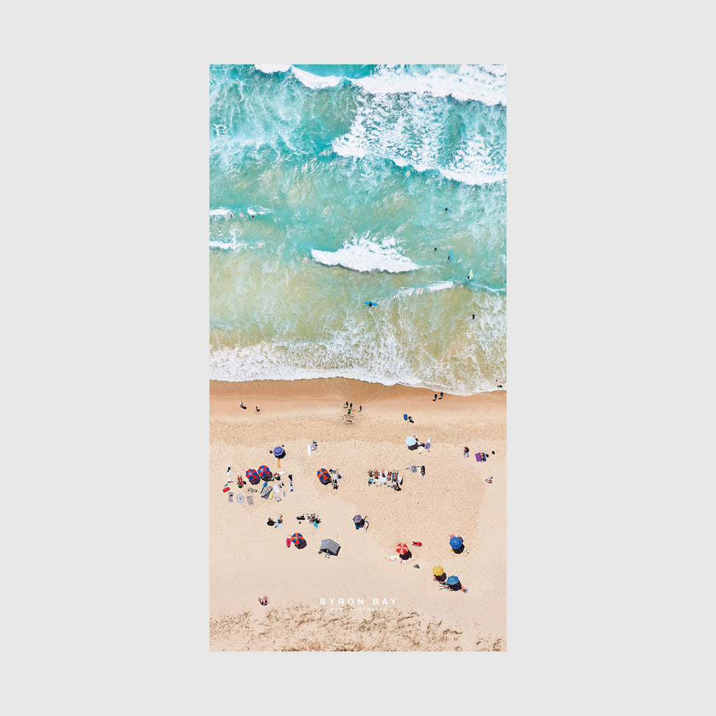 Aerial view of Byron Bay beach with turquoise waves and colorful umbrellas,quick-dry beach towel by Remy Gerega