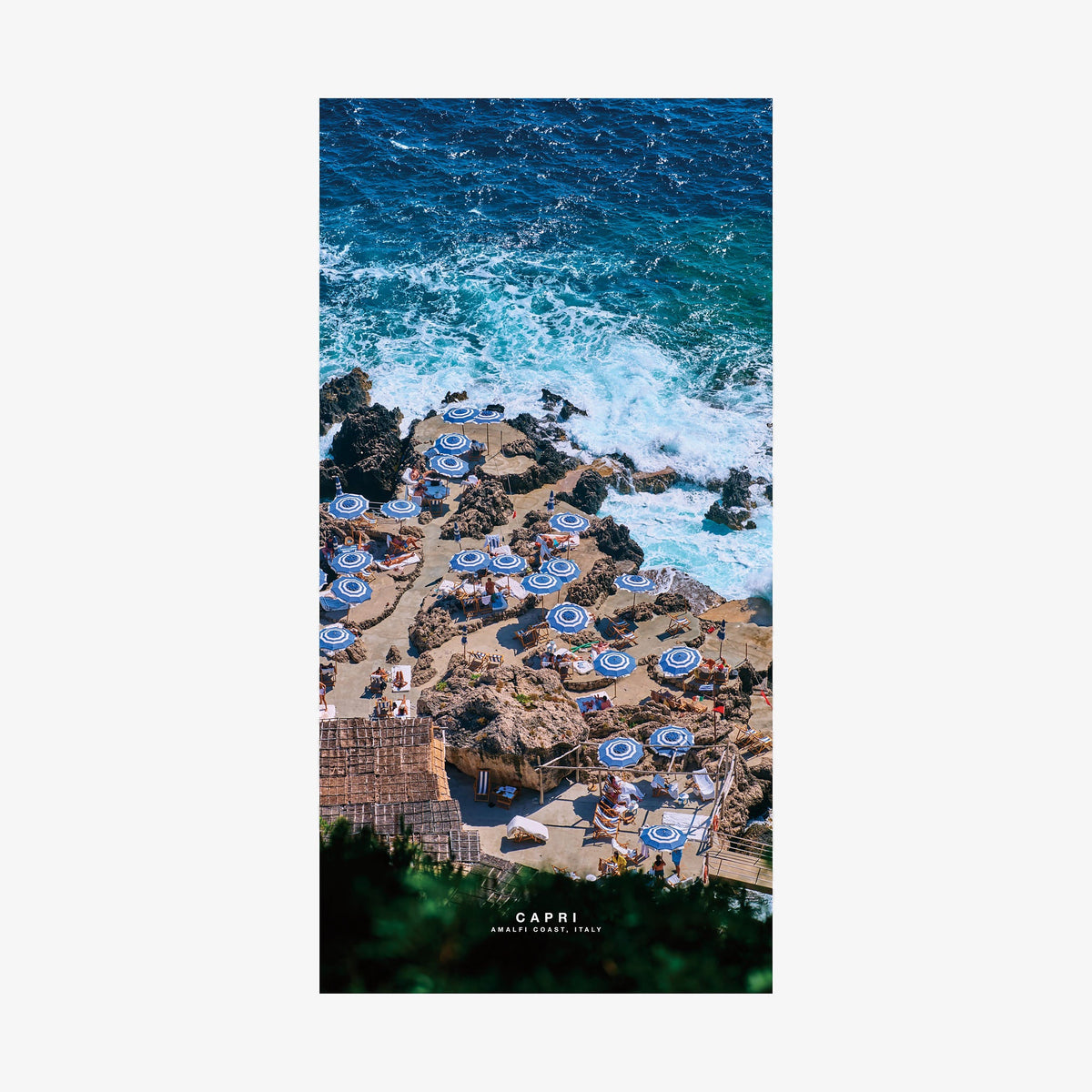 Aerial view of Capri beach cove with blue umbrellas and turquoise waves, Amalfi Coast Italy, quick-dry beach towel by Remy Gerega